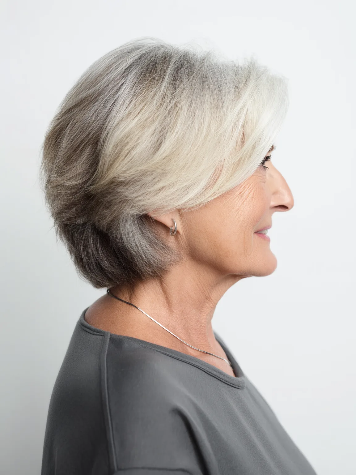 Voluminous Short Layers with Silver and Ice Blonde Highlights